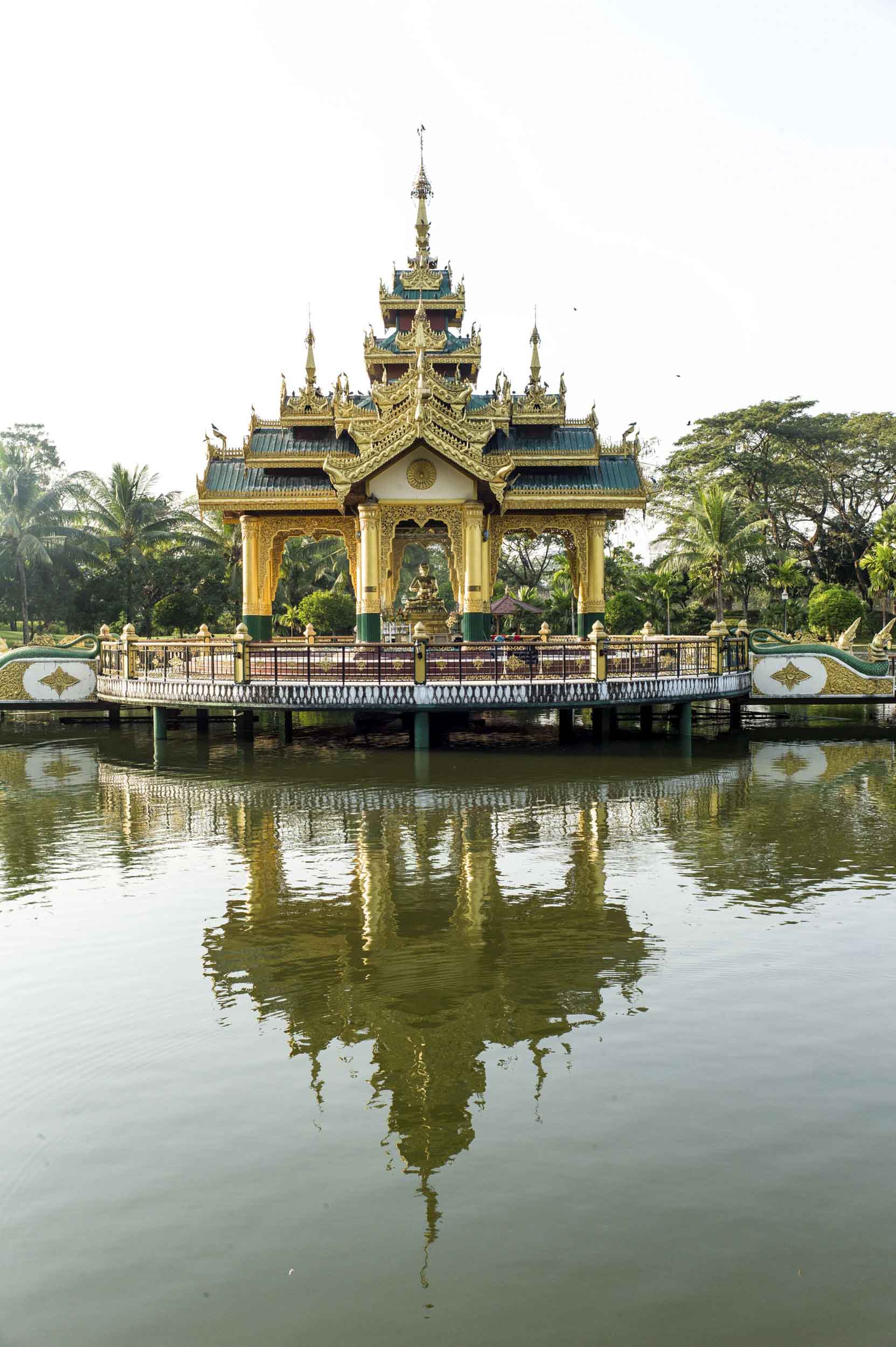 The park just outside Shwedagon Pagoda is full of reflecting pools and ornate temples, 2012