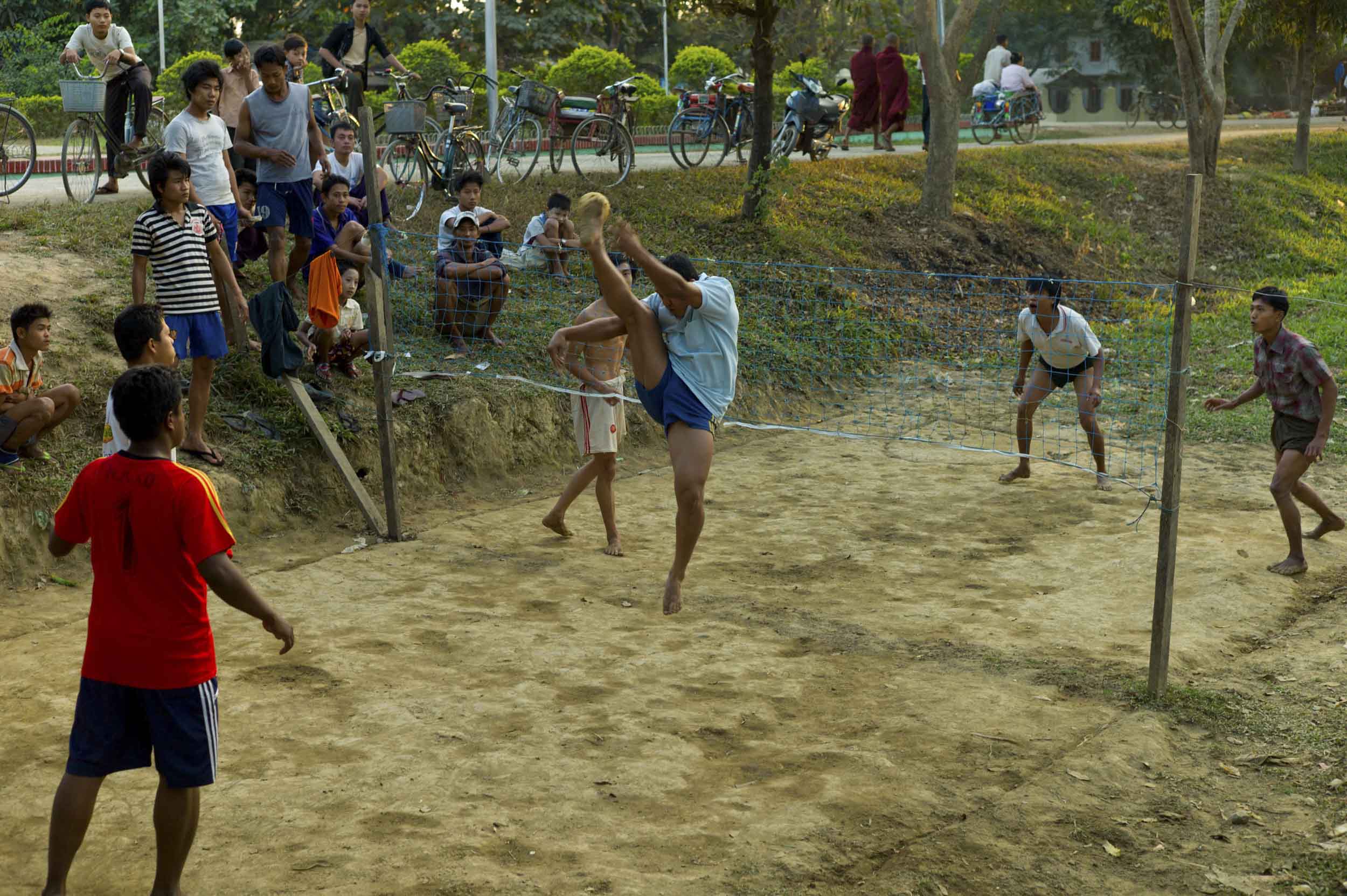 The Burmese game Chinlon follows volleyball rules and is played with a rattan ball. Hands are prohibited but the rest of the body is allowed, 2012