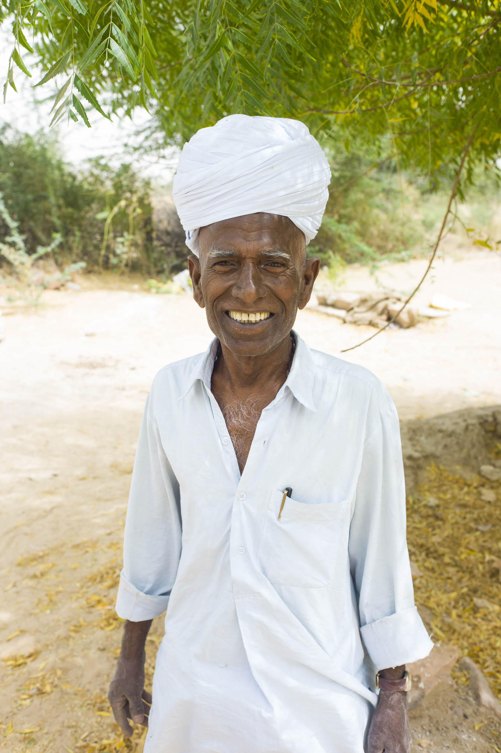 A disciple of the Naga Baba named Adesh. Naga Babas abstain from clothes and Adesh lives in the desert and in a white painted cave near Salawas Village, 2012