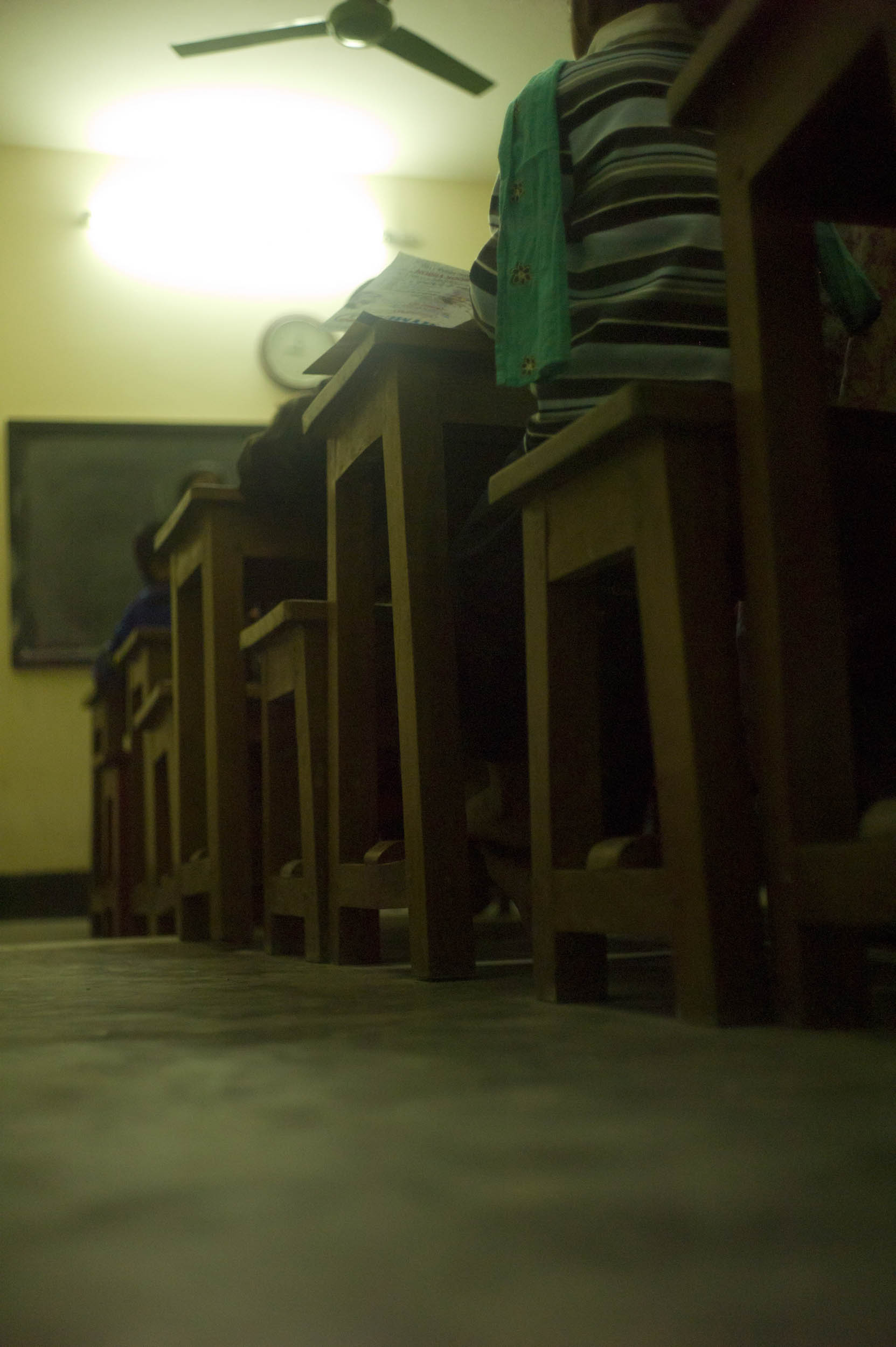 Wood desks and benches in an elementary classroom