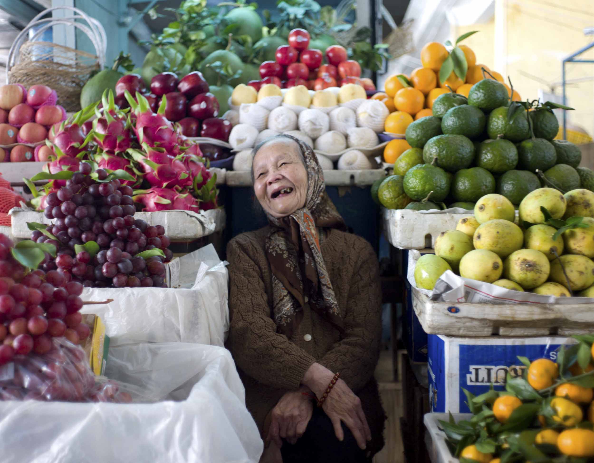 A fruit vendor in Da Lat’s Central Market. With its temperate climate in Vietnam’s Central Highlands, Da Lat was created by the French in the 19th century as a resort center, 2011